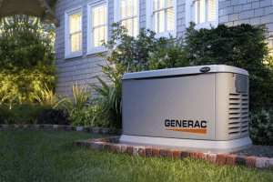 A whole home generator sitting outside home; this is great for power outage preparedness. 