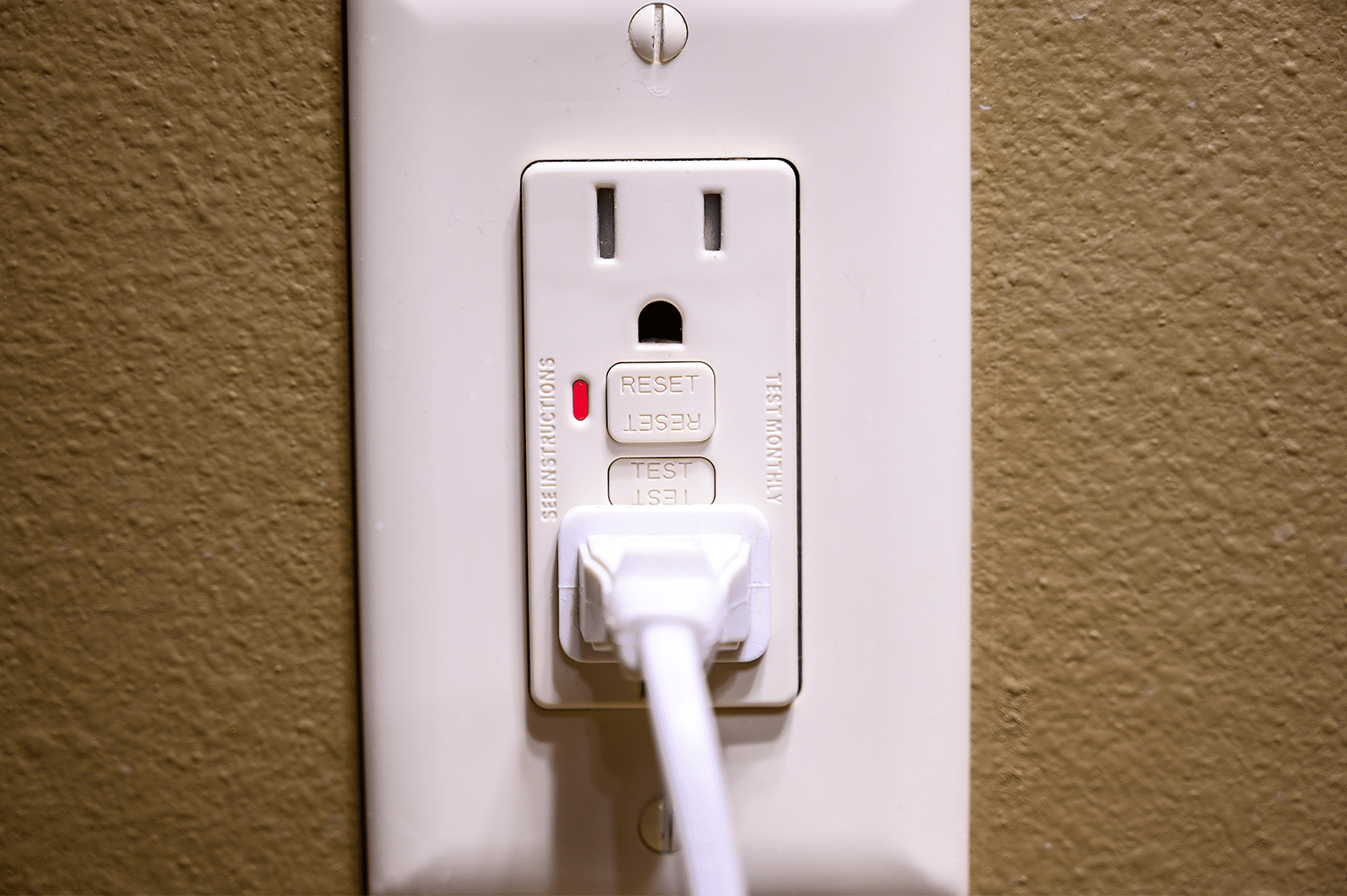 gfci outlet trips when light switch is turned on